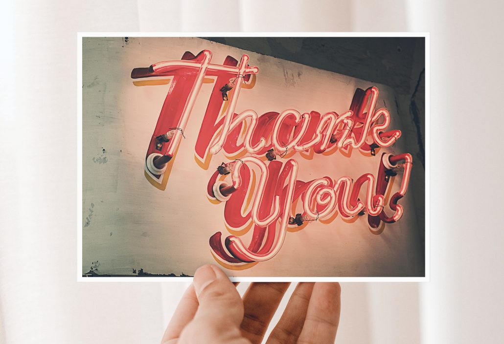 Thank you cards with Thank You lettering made of neon tubes  